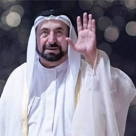 Sultan Muhammad Al Qasimi acknowledging an audience at a public engagement